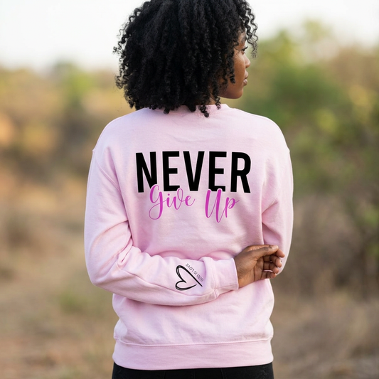 Never Give Up crewneck sweatshirt with motivational graphic