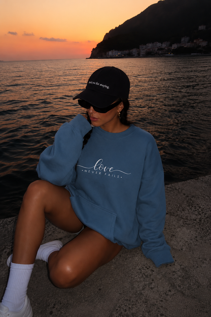 Love Never Fails Sweatshirt