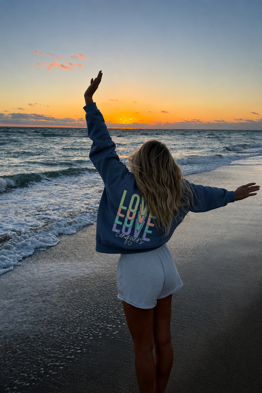 Love Conquers Sweatshirt