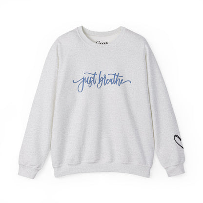 Just Breathe crewneck sweatshirt with inspirational graphic